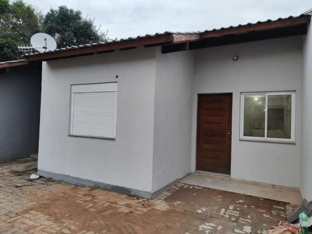 Casa em condomínio fechado com 2 quartos à venda na Rua Manoel Sebastião Gomes Filho, 1462, Flórida, Guaíba por R$ 175.000