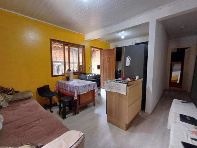 Casa com 3 quartos à venda na Macapá, 36, Jardim Santa Rita, Guaíba por R$ 240.000