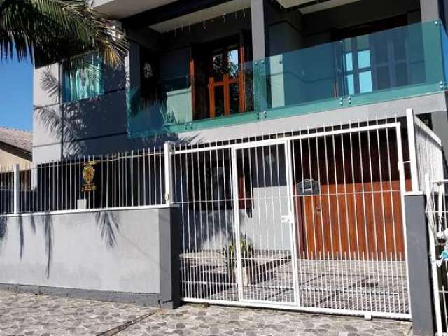 Casa com 3 quartos à venda na Capitão Rodrigo, 41, Jardim dos Lagos, Guaíba por R$ 550.000