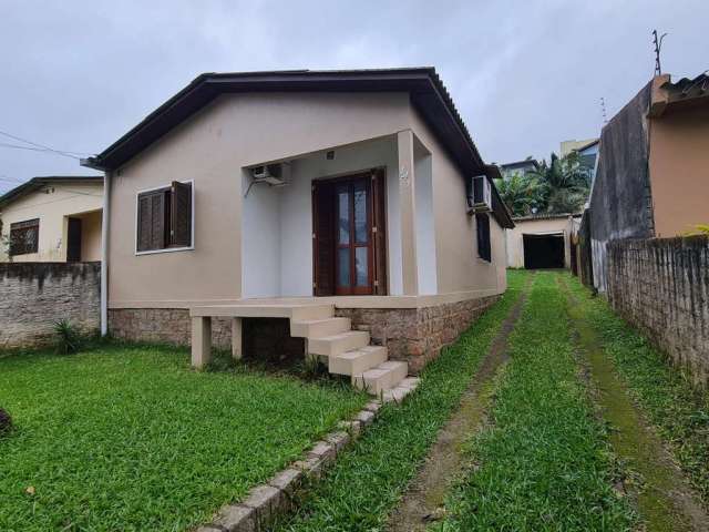 Casa com 2 quartos à venda na Rua Arcelino José da Silveira, 141, Ermo, Guaíba por R$ 479.000