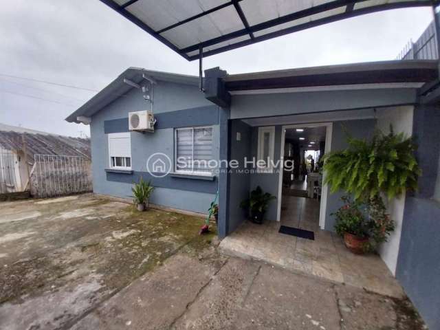 Casa com 3 quartos à venda na Salustiano Avelino  Ribeiro, 710, Morada da Colina, Guaíba por R$ 435.000