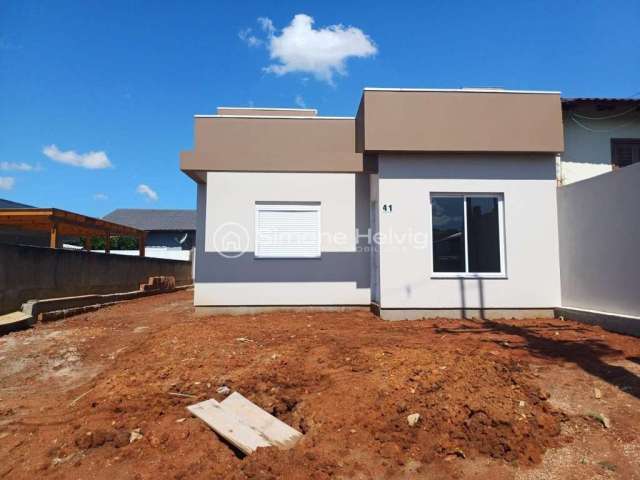 Casa com 3 quartos à venda na Rua Franque Andrei Beck Ribas, 41, Jardim dos Lagos, Guaíba por R$ 425.000