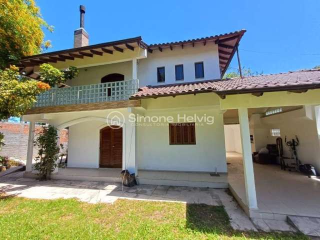 Casa com 3 quartos à venda na Raul Pila, 1815, Flórida, Guaíba por R$ 890.000