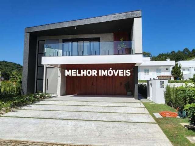 Residencial Praia Brava - Casa Nova em condomínio fechado à venda com 5 suítes, 6 vagas de garagem localizada na Praia Brava