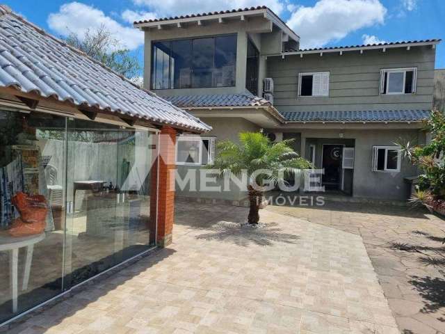 Casa com 3 quartos à venda na Rua Coronel João Pacheco de Freitas, 404, Jardim Itu Sabará, Porto Alegre por R$ 700.000