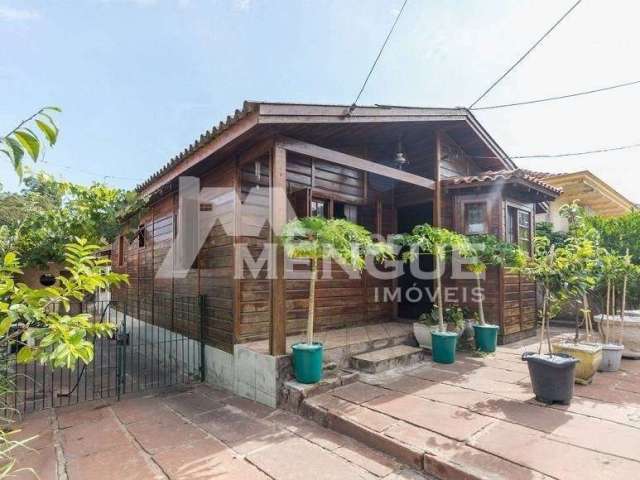 Casa com 2 quartos à venda na Rua Barão de Itaqui, 130, Jardim São Pedro, Porto Alegre por R$ 428.000