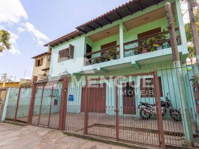 Casa com 3 quartos à venda na Rua Guadalajara, 115, Jardim Itu Sabará, Porto Alegre por R$ 750.000