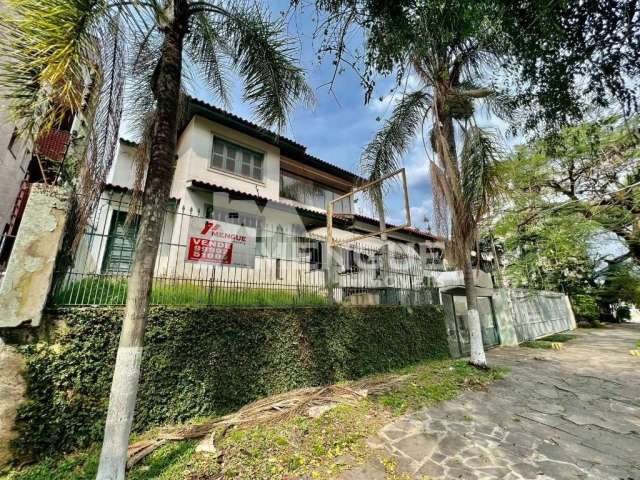 Casa com 3 quartos à venda na Avenida Quito, 415, Jardim Lindóia, Porto Alegre por R$ 1.500.000