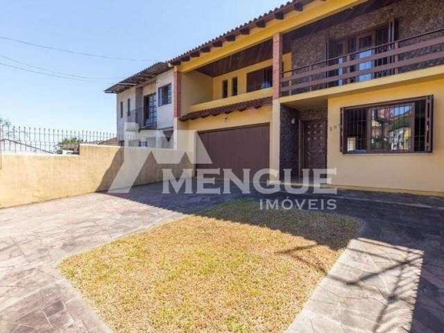 Casa com 3 quartos à venda na Avenida Ipê, 298, Vila Jardim, Porto Alegre por R$ 890.000