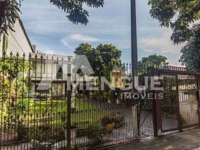 Casa com 5 quartos à venda na Rua Serro Azul, 1039, Santa Maria Goretti, Porto Alegre por R$ 689.000