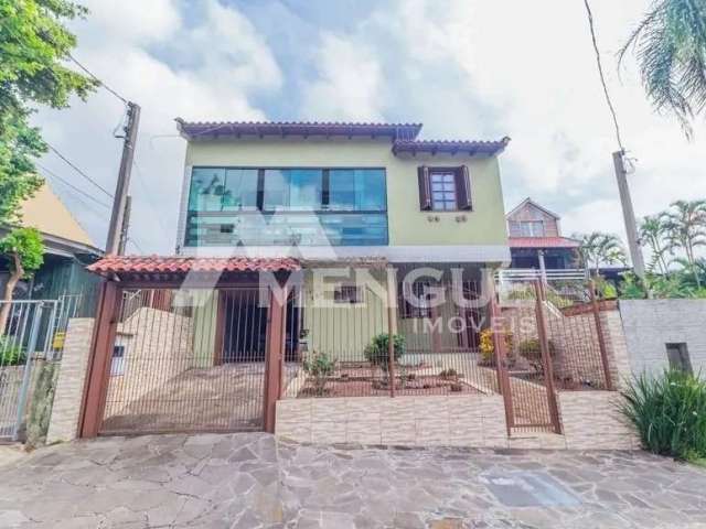 Casa com 4 quartos à venda na Rua Bento Rosa, 242, Sarandi, Porto Alegre por R$ 749.000