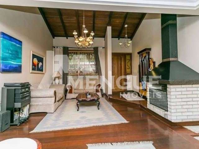 Casa com 4 quartos à venda na Rua José Scutari, 294, Passo da Areia, Porto Alegre por R$ 950.000