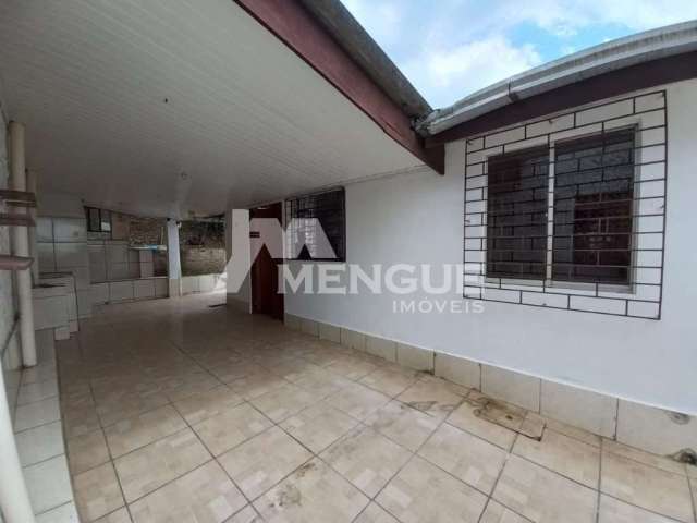 Casa com 3 quartos à venda na Tiradentes, 970, Jardim Porto Alegre, Alvorada por R$ 450.000