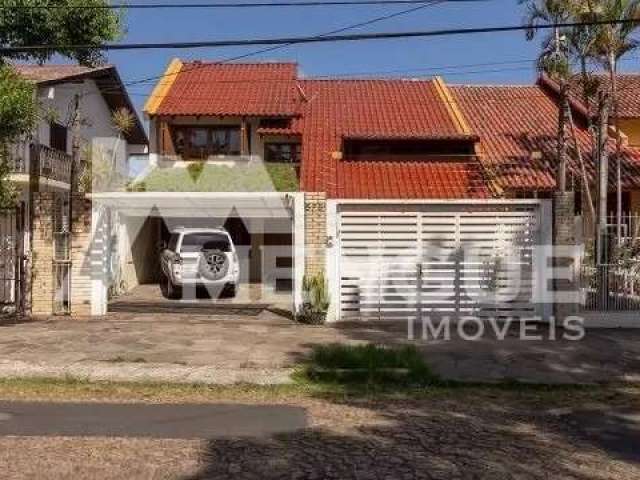 Casa com 4 quartos à venda na Rua Doutor Paulino Guerra, 575, Jardim Itu Sabará, Porto Alegre por R$ 1.298.000