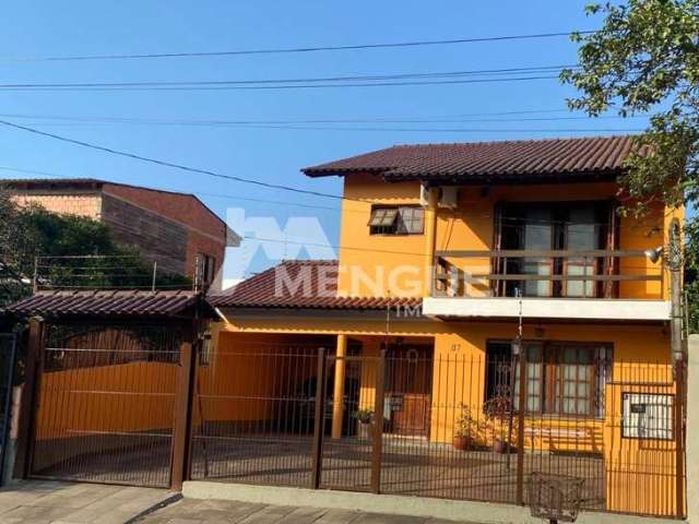 Casa com 3 quartos à venda na Rua Cacilda Yaconis Becker, 87, Rubem Berta, Porto Alegre por R$ 650.000