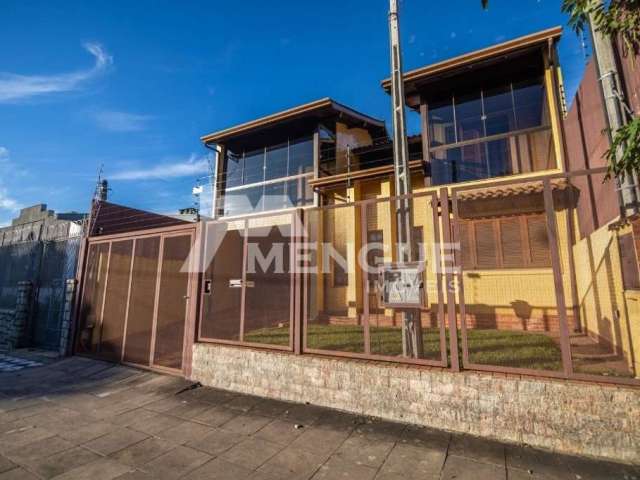 Casa com 4 quartos à venda na Rua Ricalde Marques, 205, Jardim São Pedro, Porto Alegre por R$ 1.120.000