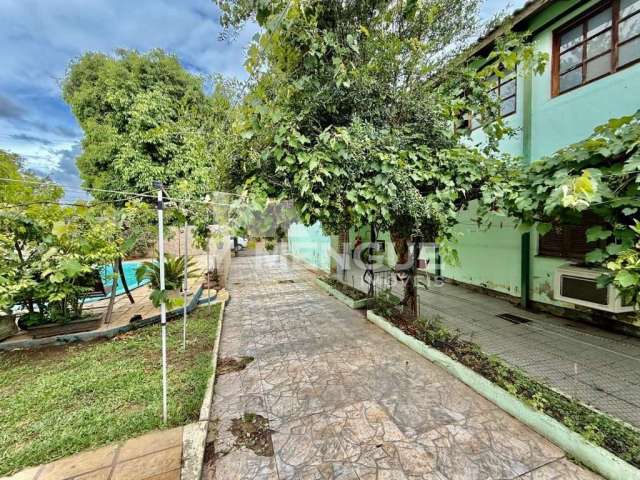 Casa com 4 quartos à venda na Rua Rezende Costa, 498, Sarandi, Porto Alegre por R$ 1.200.000