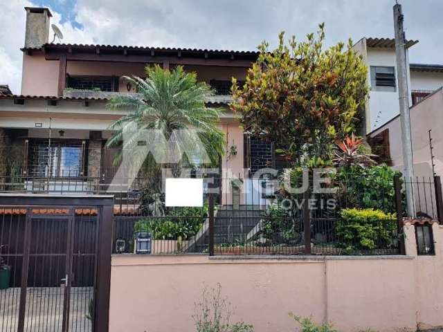 Casa com 5 quartos à venda na Rua Nove de Março, 393, Vila Ipiranga, Porto Alegre por R$ 880.000