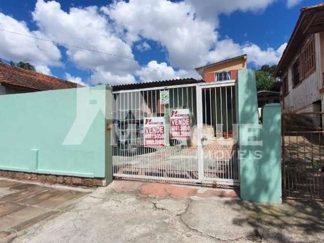 Casa com 5 quartos à venda na Rua Nove de Março, 457, Vila Ipiranga, Porto Alegre por R$ 585.000