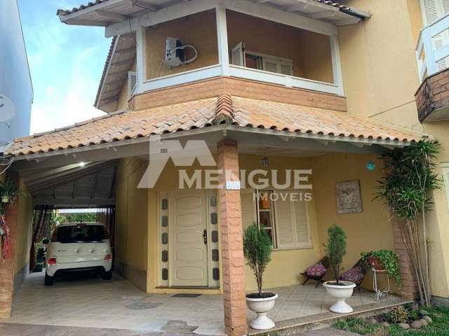 Casa com 3 quartos à venda na Rua Raymundo Luiz Marinho Filho, 252, Parque Santa Fé, Porto Alegre por R$ 800.000