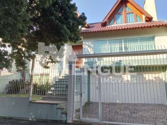 Casa com 5 quartos à venda na Rua Maestro Salvador Campanella, 46, Jardim Itu Sabará, Porto Alegre por R$ 1.400.000