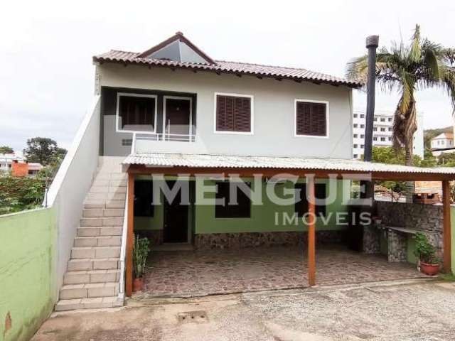 Casa em condomínio fechado com 2 quartos à venda na Rua Irene Capponi Santiago, 329, Cristo Redentor, Porto Alegre por R$ 329.000