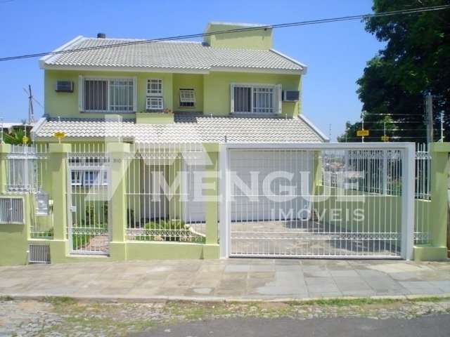 Casa com 3 quartos à venda na Rua Pedro A. A. de Freitas Filho, 310, Jardim Itu Sabará, Porto Alegre por R$ 1.199.000