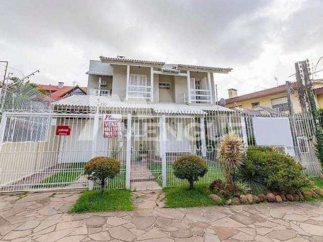 Casa com 3 quartos à venda na Avenida José Gertum, 355, Chácara das Pedras, Porto Alegre por R$ 2.300.000