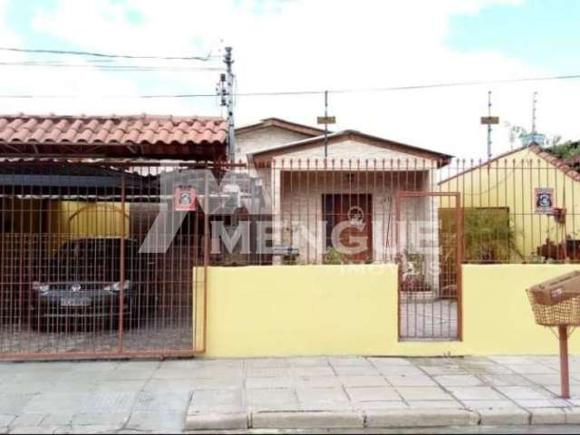 Casa com 3 quartos à venda na Rua Carmense, 140, Parque Santa Fé, Porto Alegre por R$ 350.000