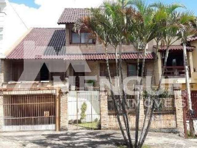 Casa com 5 quartos à venda na Rua Chafic João Scaf, 137, Jardim Itu Sabará, Porto Alegre por R$ 2.120.000