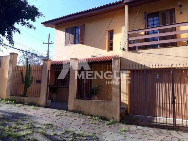 Casa com 3 quartos à venda na Rua Monte Flor, 68, Jardim Floresta, Porto Alegre por R$ 590.000