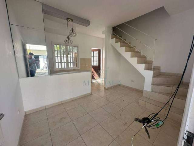 Village com 1 dormitório à venda, 45 m² por R$ 195.000 - Vista Linda Bertioga - Bertioga/SP