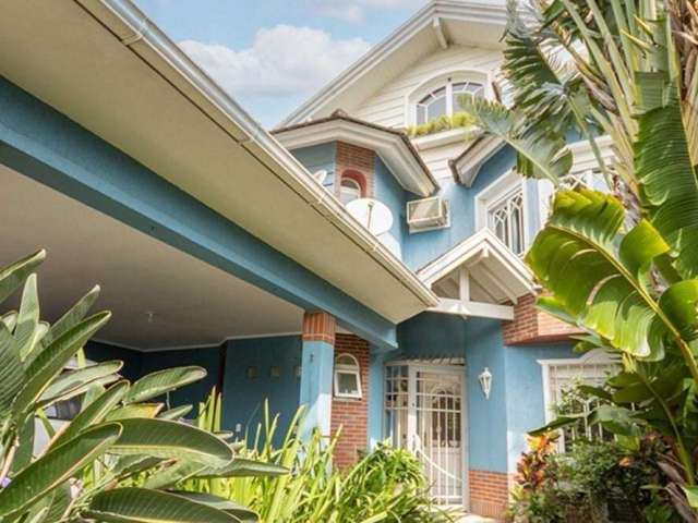 Casa com 4 quartos à venda na Rua Fernando Abbott, 564, Cristo Redentor, Porto Alegre, 279 m2 por R$ 1.099.000