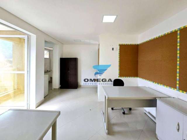 Sala comercial à venda na praia das Pitangueiras no Guarujá I Omega Imoveis