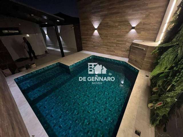 Casa com 2 dormitórios à venda por R$ 980.000 - Maracanã - Praia Grande/SP