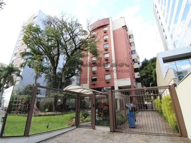 Apartamento com sacada, churrasqueira e garagem.