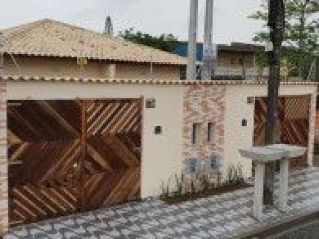 Casa no bairro Balneário Tupy, em Itanhaém - ficando lado praia, em rua calçada.