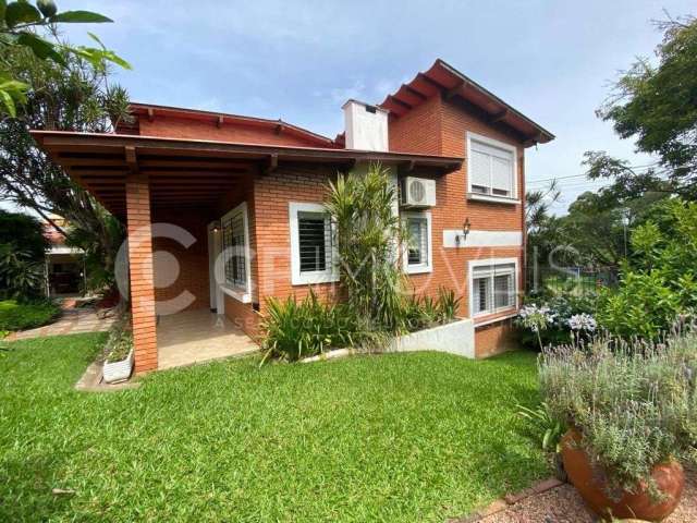 Casa com 3 quartos à venda na Rua Santo Camaratta Santino, 15, Parque Santa Fé, Porto Alegre, 253 m2 por R$ 1.090.000