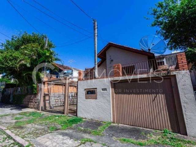 Casa com 3 quartos à venda na Acesso José da Silva Bernardo, 215, Jardim Itu Sabará, Porto Alegre, 200 m2 por R$ 380.000