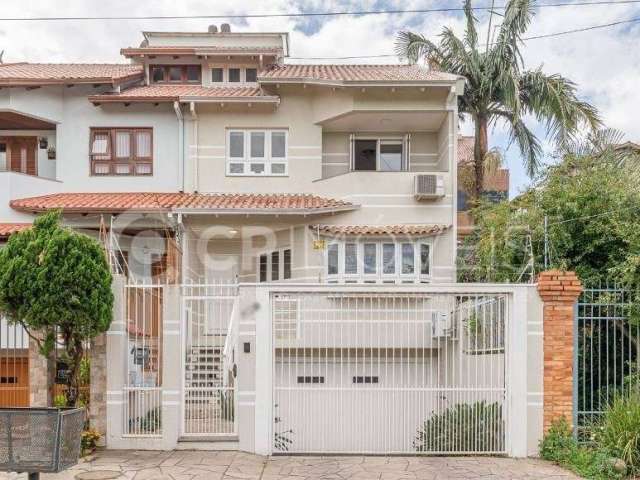 Casa com 3 quartos à venda na Professor Isidoro La Porta, 112, Jardim Planalto, Porto Alegre, 308 m2 por R$ 1.600.000