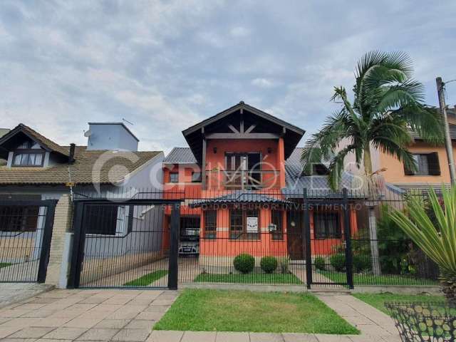 Casa com 3 quartos à venda na Rua Maria Elaine Wotter, 105, Parque Santa Fé, Porto Alegre, 209 m2 por R$ 860.000