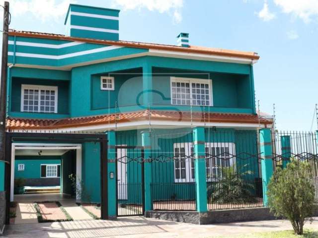 Casa com 3 quartos à venda na Rua Santo Expedito, 63, Parque Santa Fé, Porto Alegre, 262 m2 por R$ 848.000