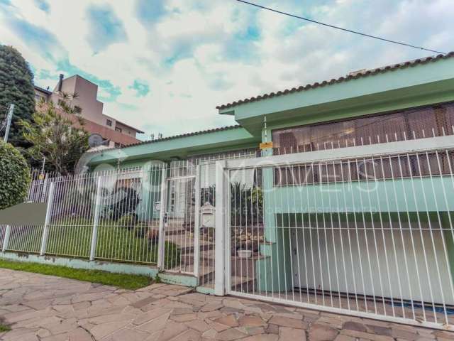 Casa com 4 quartos à venda na Rua Arequipa, 19, Jardim Lindóia, Porto Alegre, 225 m2 por R$ 1.400.000