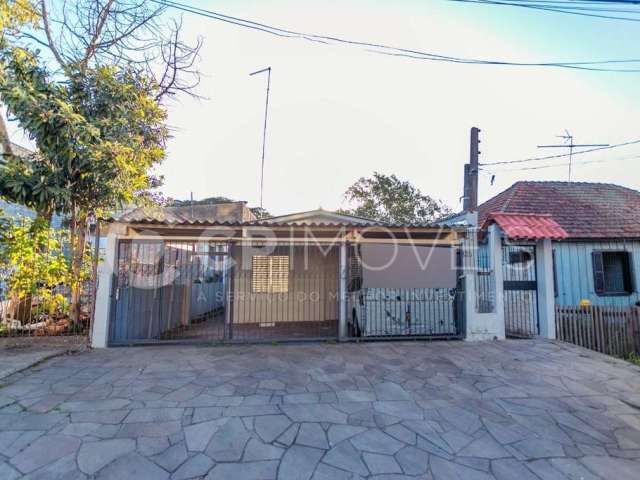 Casa com 3 quartos à venda na Rua Diamantina, 328, Jardim Floresta, Porto Alegre, 130 m2 por R$ 540.000