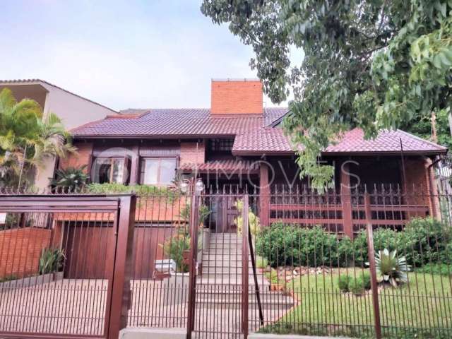 Casa com 4 quartos à venda na Walir Zottis, 352, Jardim Planalto, Porto Alegre, 330 m2 por R$ 1.865.000