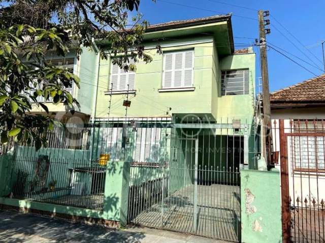 Casa com 3 quartos à venda na Avenida França, 359, Navegantes, Porto Alegre, 151 m2 por R$ 590.000