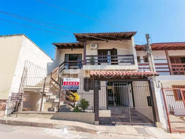 Casa com 4 quartos à venda na Rua Waldomiro Silveira Dias, 40, Jardim Itu Sabará, Porto Alegre, 245 m2 por R$ 450.000