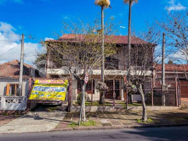 Casa com 4 quartos à venda na Avenida Alberto Pasqualini, 347, Jardim Itu Sabará, Porto Alegre, 356 m2 por R$ 1.500.000