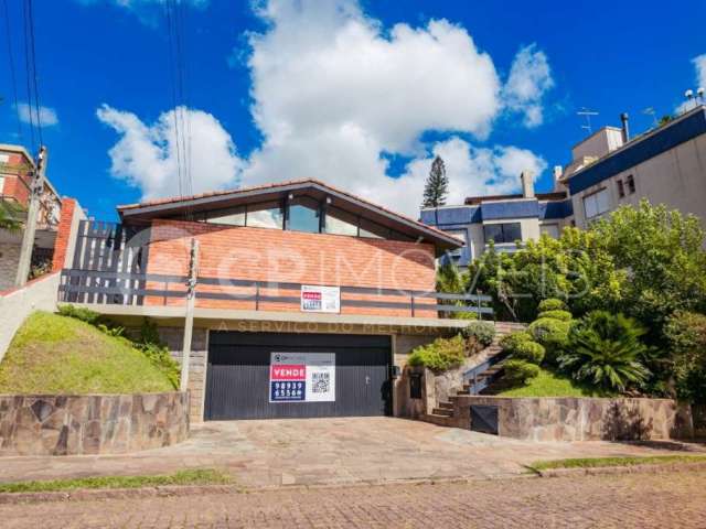 Casa com 4 quartos à venda na Travessa Java, 76, Jardim Lindóia, Porto Alegre, 399 m2 por R$ 1.095.000