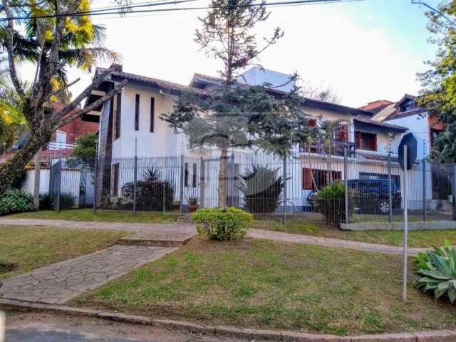 Casa com 5 quartos à venda na Rua Araponga, 06, Chácara das Pedras, Porto Alegre, 320 m2 por R$ 1.990.000